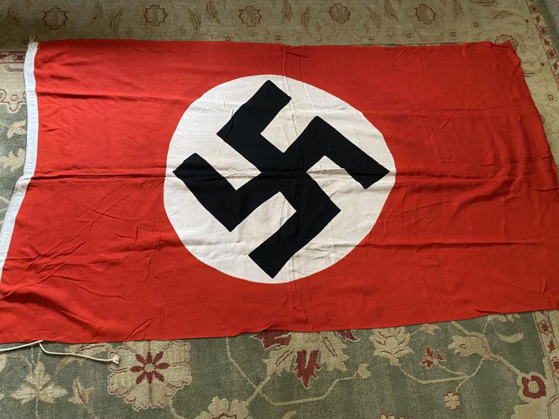 MEDIUM SIZED NSDAP FLAG WITH ROPE.