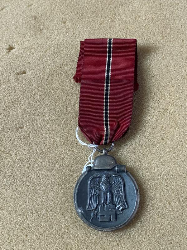 THIRD REICH RUSSIAN FRONT MEDAL WITH RIBBON.