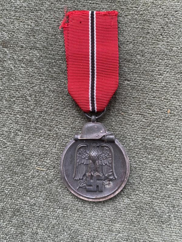 THIRD REICH EASTERN FRONT ‘Ostmedaille‘ MEDAL WITH MARKED RING.