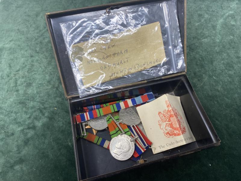 WW2 MEDALS IN TIN MONEY BOX - AS FOUND.