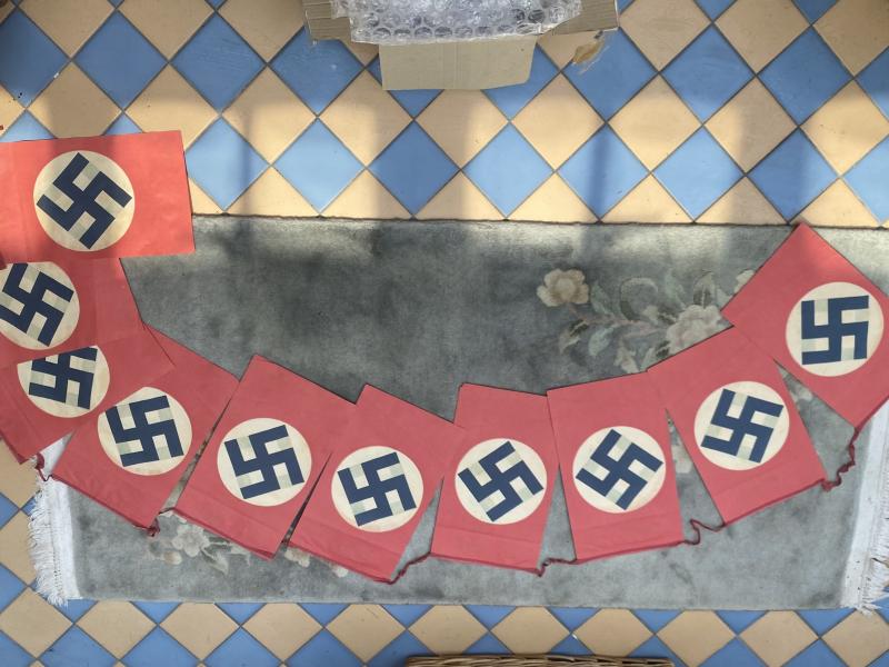 A SET OF NSDAP PAPER RALLY FLAGS - STRING OF 10.