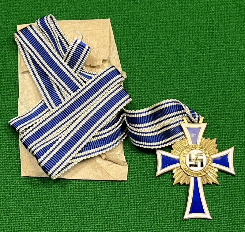 German WWII , Mother's Cross in Gold.