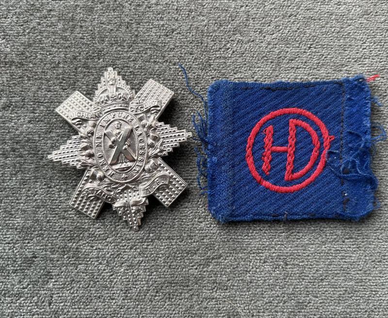 51st HIGHLAND DIVISION CAP BADGE AND ARM PATCH.