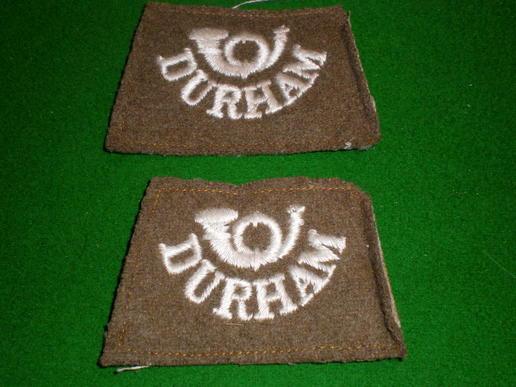 WW1 Durham Light Infantry shoulder titles.