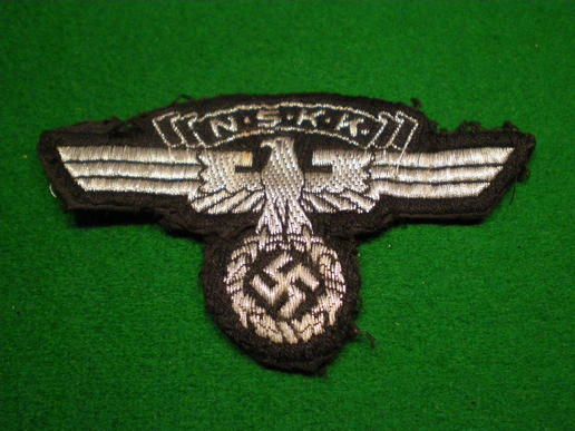 NSKK Cap emblem.