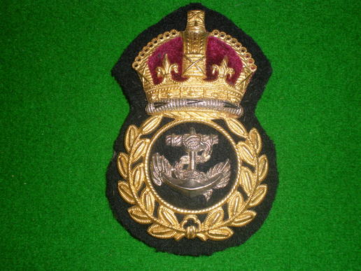 WW II Chief Petty Officer's cap badge.