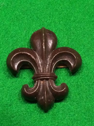 WW2 Plastic Manchester Regiment Cap Badge.