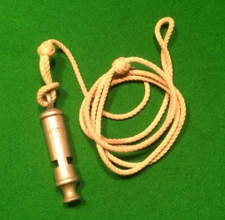 1916 dated Trench Whistle & Lanyard.