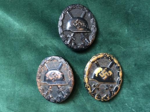 THREE THIRD REICH BLACK WOUND BADGES-AS A LOT.