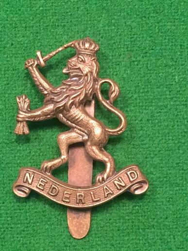 WW2 British made Dutch Army Cap Badge.