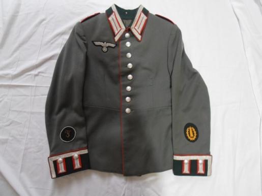 EARLY THIRD REICH 'WAFFENROCK' PARADE TUNIC FOR SENIOR ARTILLERY SERGEANT.