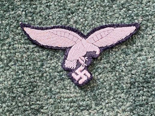 MINT EXAMPLE OF EARLY 'DROOP TAIL' LUFTWAFFE BULLION BREAST EAGLE.