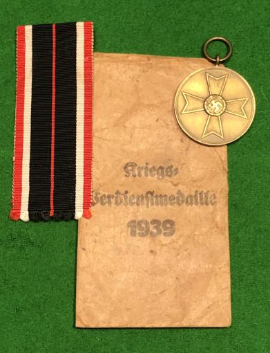 War Merit medal and Packet.