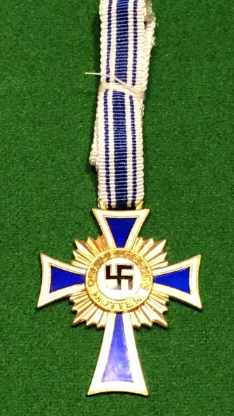 German WWII , Mother's Cross in Gold.