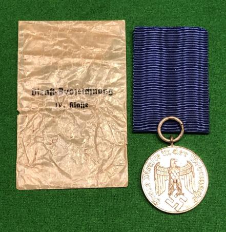 Wehrmacht 4 Year Service Medal with Packet of Issue.