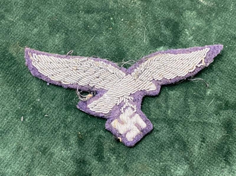 LUFTWAFFE OFFICERS BREAST EAGLE REMOVED FROM TUNIC.