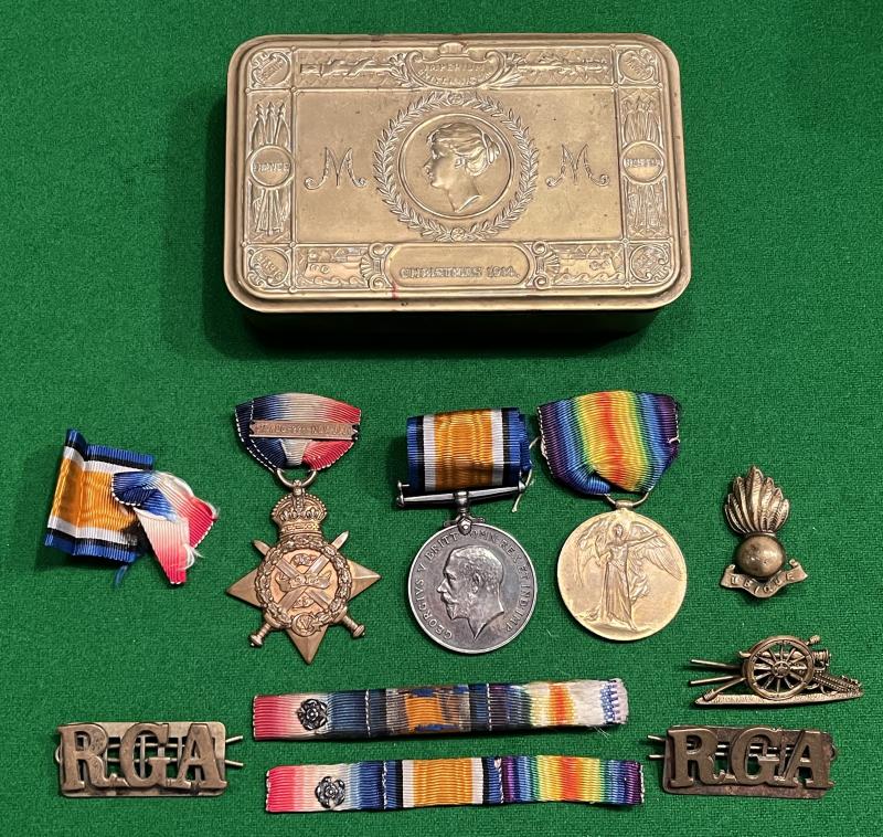 WW1 1914 Trio RGA in Princess Mary Tin with badges etc.