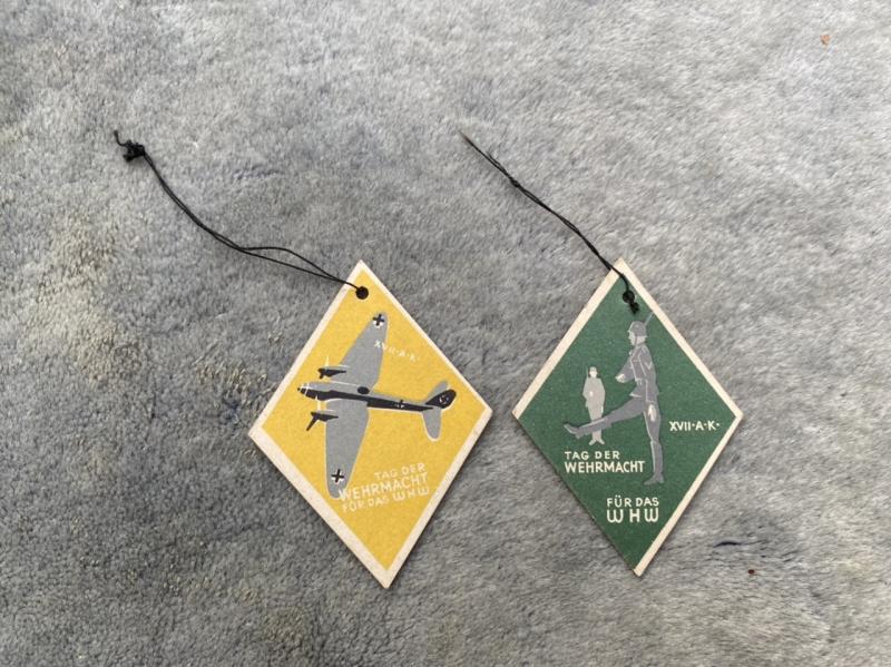 TWO PAPER TAGS FOR WEHRMACHT WHW. (WINTER HELP RELIEF)