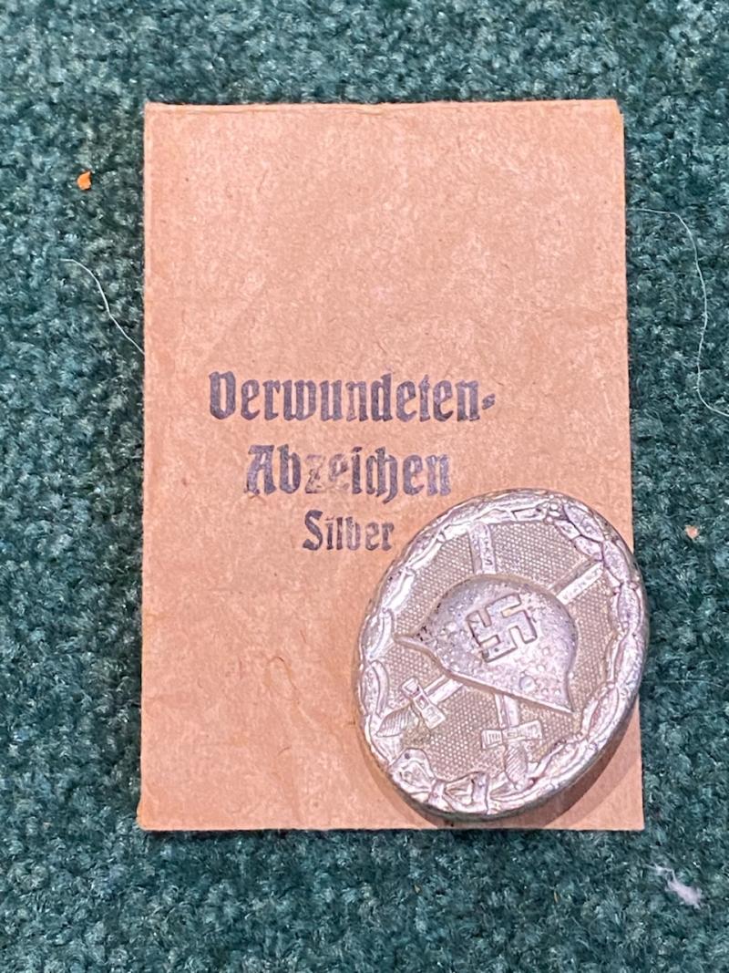 THIRD REICH SILVER WOUND BADGE IN ORIGINAL PACKET.